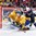 MONTREAL, CANADA - JANUARY 2: Sweden's Kristoffer Gunnarsson #6 and Slovakia's Adam Ruzicka #20 battle for the loose puck while Felix Sandstrom #1 look on during quarterfinal round action at the 2017 IIHF World Junior Championship. (Photo by Andre Ringuette/HHOF-IIHF Images)

